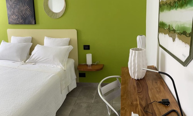 Piumazzo Apartment | Cozy whole apartment in quiet area with indoor car parking.