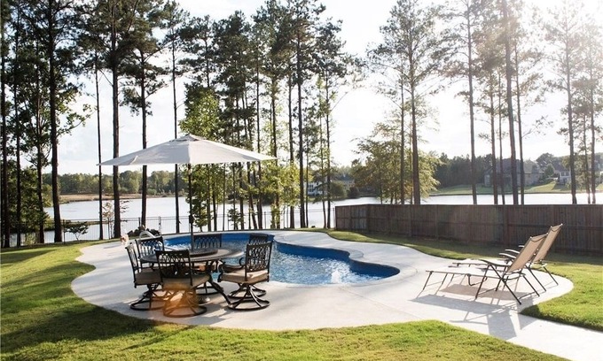 Waverly House | Ideal gameday house in Auburn with pool, theater, lake, putting green, and more!