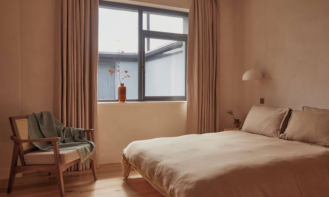 Ballycastle Apartment | Yarn - Honor is a spacious luxury suite king size bed, bathroom & living/kitchen