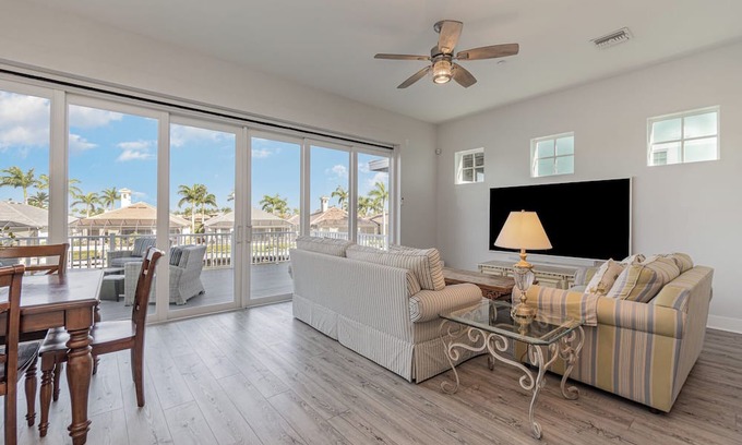 Cape Harbour Condo | 2 Story Lux Waterfront Living in Cape Harbour- Pool & Dock