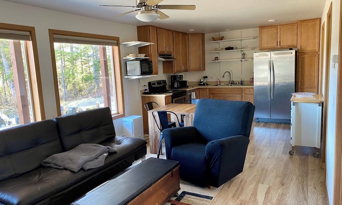 Juneau Apartment | Sunny apartment near a lake, great walking trails, and a playground on site.