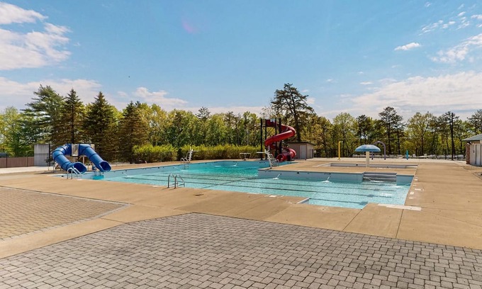 Lackawaxen House | Spacious chalet with pool, skiing, beach, arcade + more
