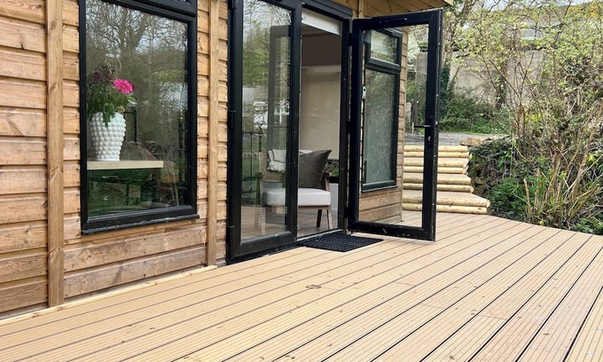 Gweek Cabin | The Mill Lodge luxury and cosy in a tranquil garden setting.
