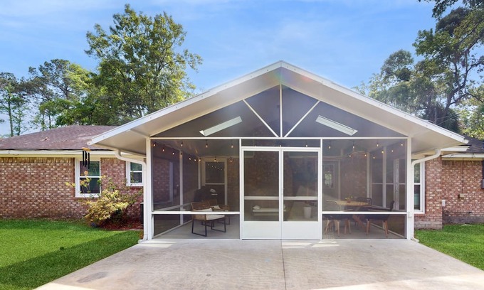 Isle of Hope Historic District House | Updated dog-friendly home with screened porch, children's items, & pellet grill