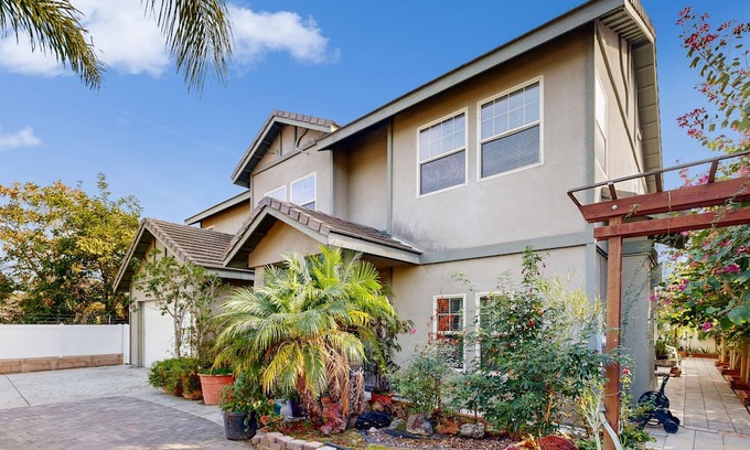 Anaheim Colony Historic District House | Centrally located home with private patio, updated interior, fireplaces, & W/D