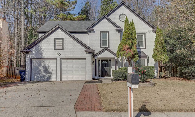 Lawrenceville Cottage | Spacious Lawrenceville Retreat w/ Fireplace + Deck
