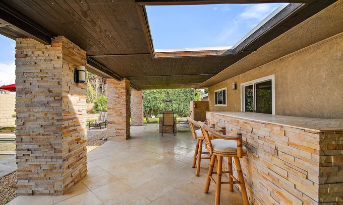 Racquet Club South House | Cozy Comfy Haven with Sparkling Pool & Hot Tub