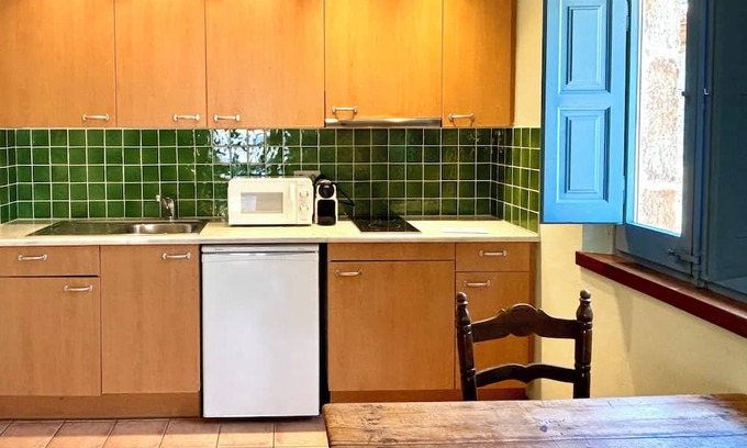Ullastret Apartment | EL FORT DúLLASTRET. Apartment 4: Double room with balcony
