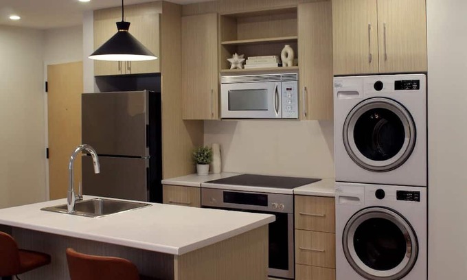 Saint John Apartment | Modern 1–BR Apartment near St. Joseph’s Hospital, Walk to Uptown, AC & Parking