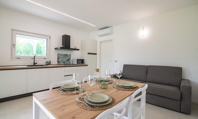 Borgo Milano Apartment | Armonia Suites Terra, new apartment with garden and pool in Verona