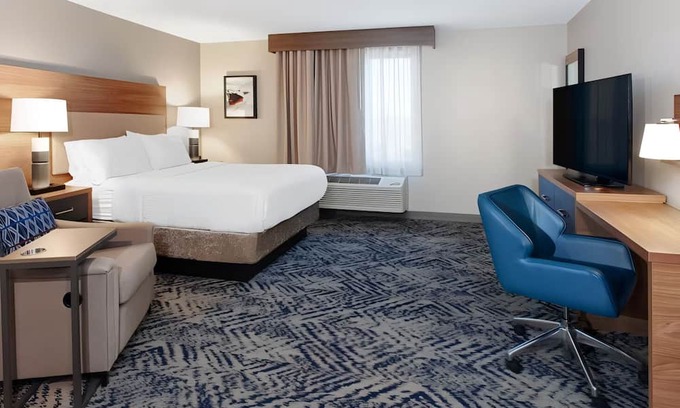 Macomb Hotel | Enjoy Restful Sleep at Elegant Suite with Kitchen Near CJ Barrymore Amusement