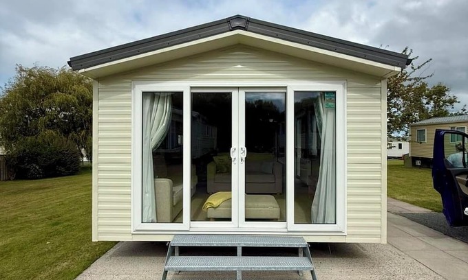 Cross Inn House | Welcoming family caravan on large pitch near beautiful New Quay in West Wales