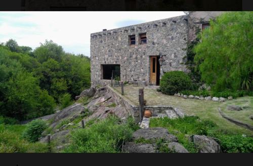 Falda del Carmen Villa | Casa de Piedra